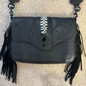 Rebecca Minkoff, small black purse with leather fringe minor wear by front clasp